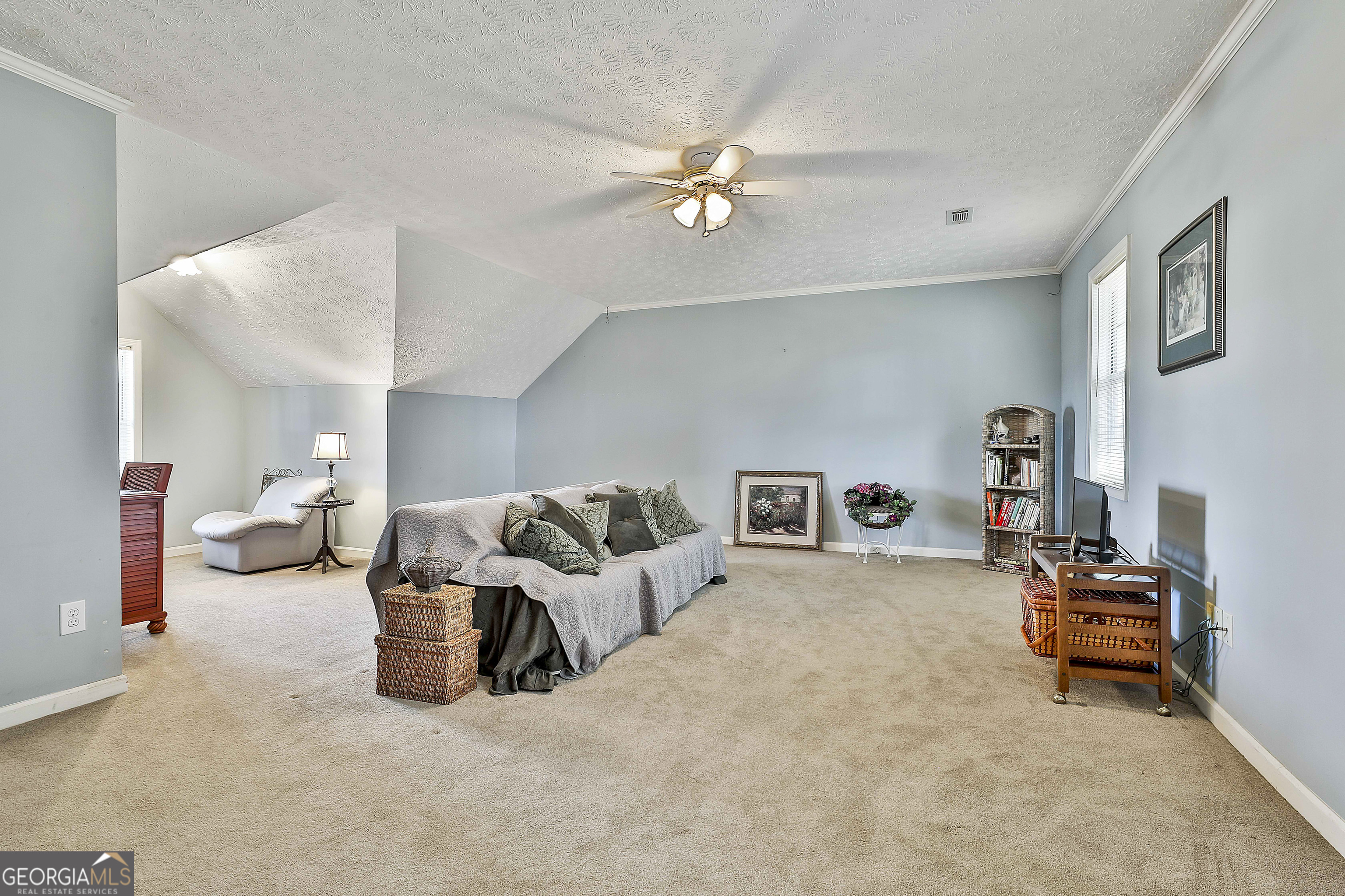 809 Lora Smith Road Newnan, GA 30265 - Photo 32 of 40 a living room with furniture