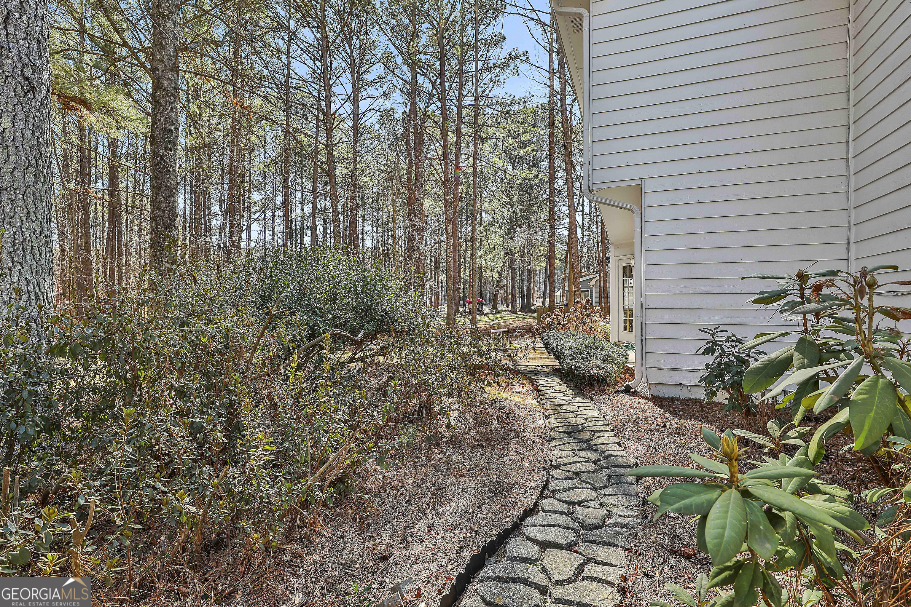 809 Lora Smith Road Newnan, GA 30265 - Photo 40 of 40 a pathway of a house with a yard