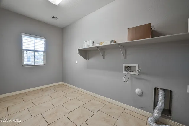 a view of a room with racks on the wall