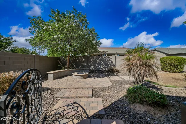 a view of a backyard with a patio