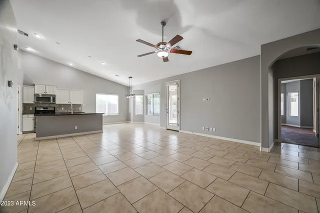 a view of a kitchen with furniture and a kitchen