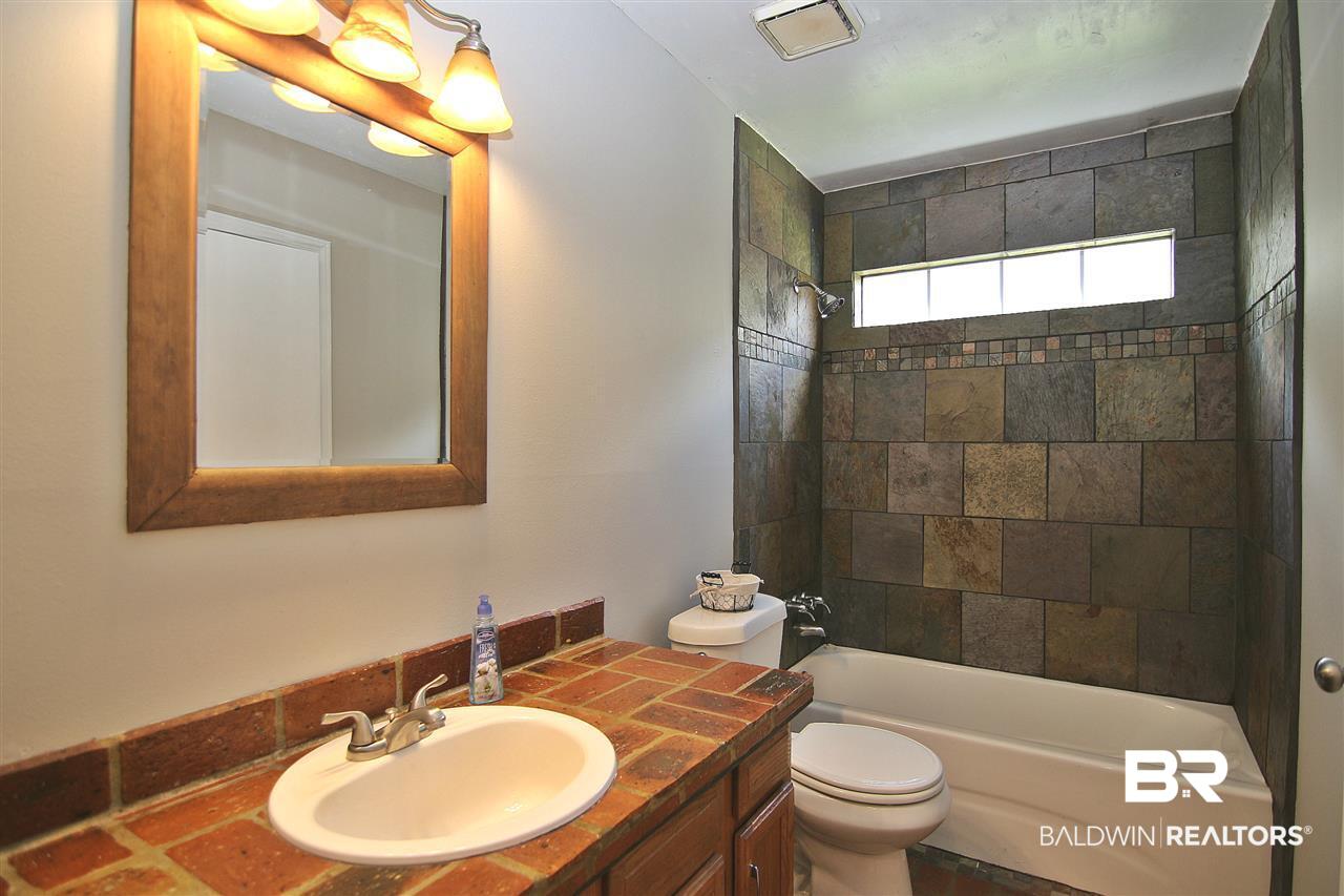 831 Copperfield Drive South Mobile, AL 36608 - Photo 16 of 24 Guest Bathroom