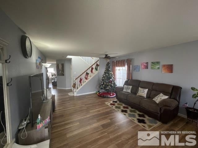 7660 Corso Street Reno, NV 89506 - Photo 3 of 21 a living room with furniture and wooden floor