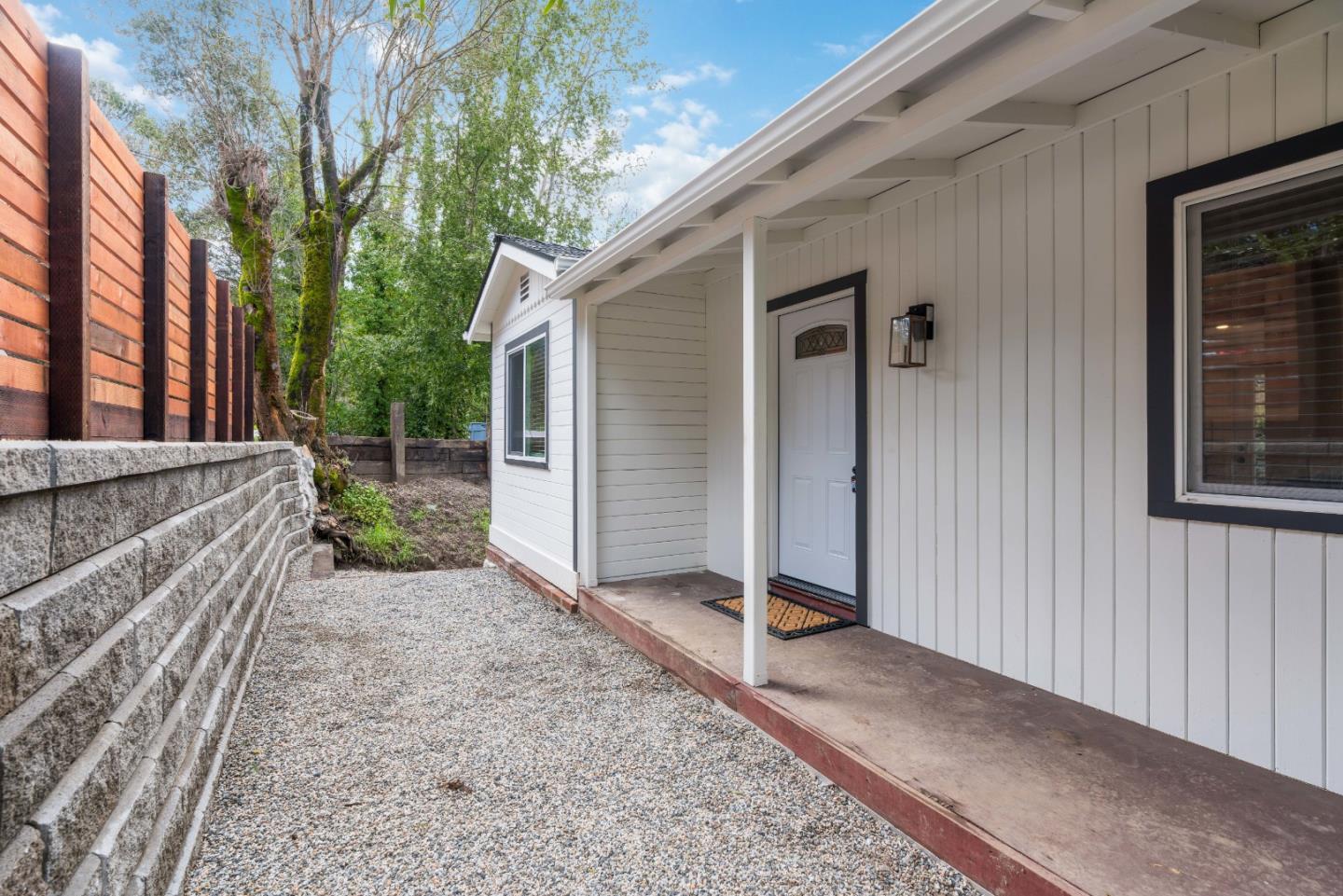7475 East Zayante Road Felton, CA 95018 - Photo 39 of 52 a backyard of a house with seating space