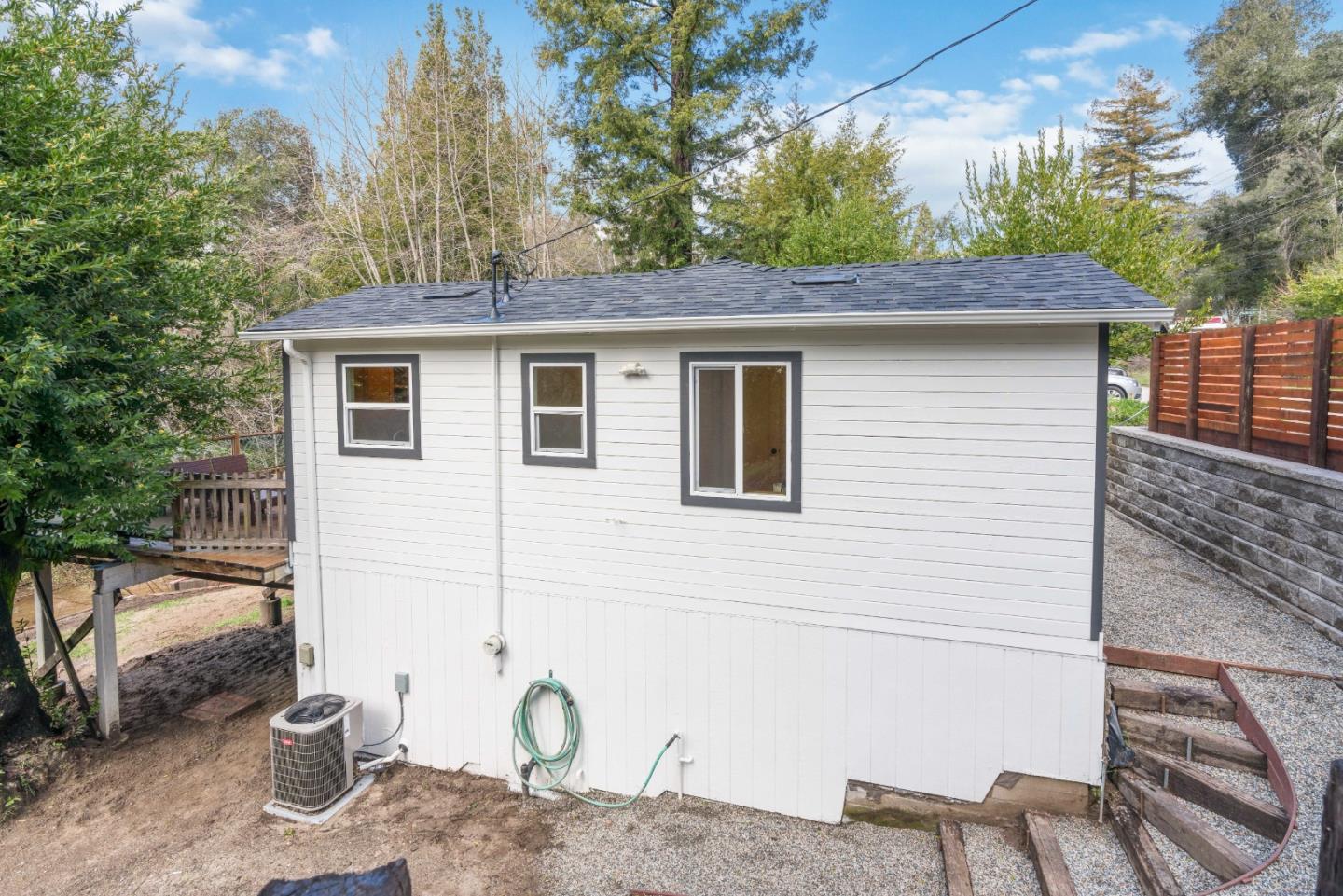 7475 East Zayante Road Felton, CA 95018 - Photo 45 of 52 a backyard of a house with seating space