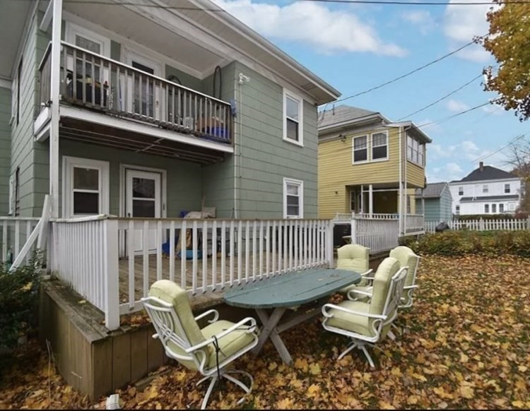 10 Arbroth Street, Unit 2 Boston, MA 02122 - Photo 8 of 8 a view of a patio with a table and chairs