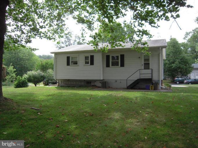 3501 Olympic Street Silver Spring, MD 20906 - Photo 4 of 23 Flat yard with large tree for shade.