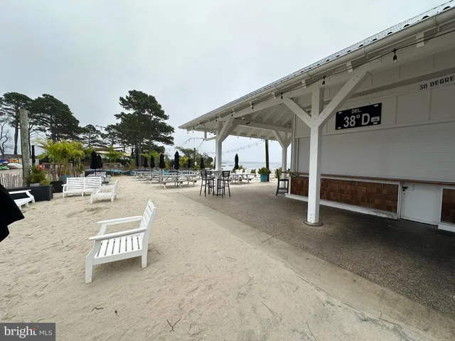 a outdoor space with lots of swings and slides