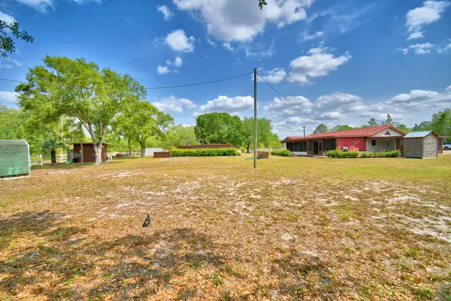 a view of a house with a swimming pool