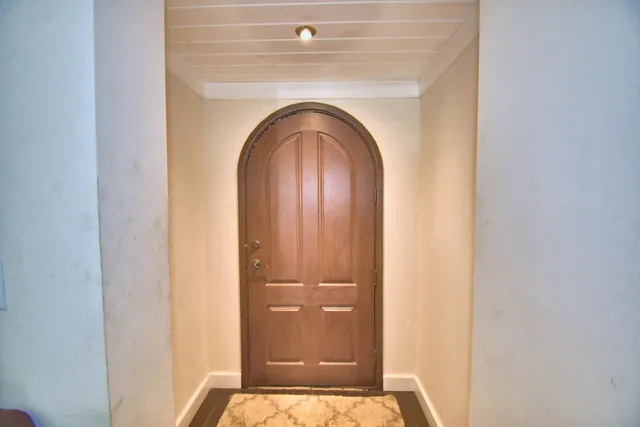 an aerial view of a house with yard swimming pool and outdoor seating