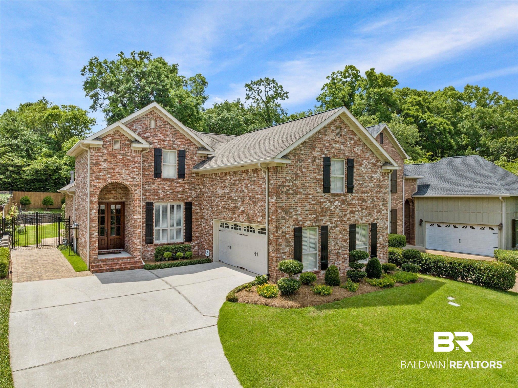 804 Country Club Road Mobile, AL 36609 - Photo 2 of 63 View of front facade with a garage and a front yard