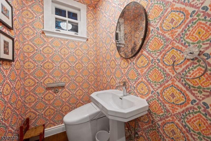 655 Lake Street Newark, NJ 07104 - Photo 21 of 49 a bathroom with a toilet and a sink