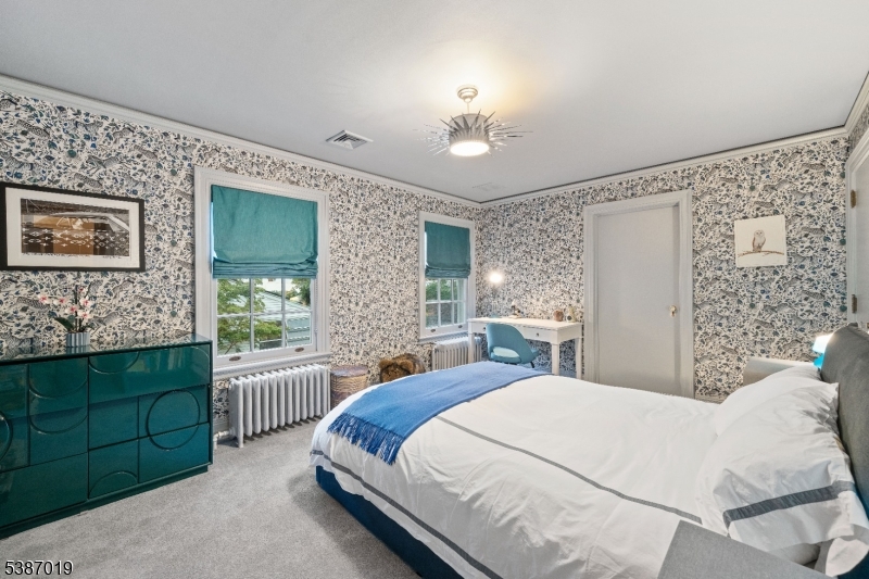 655 Lake Street Newark, NJ 07104 - Photo 29 of 49 a bedroom with a bed and a window