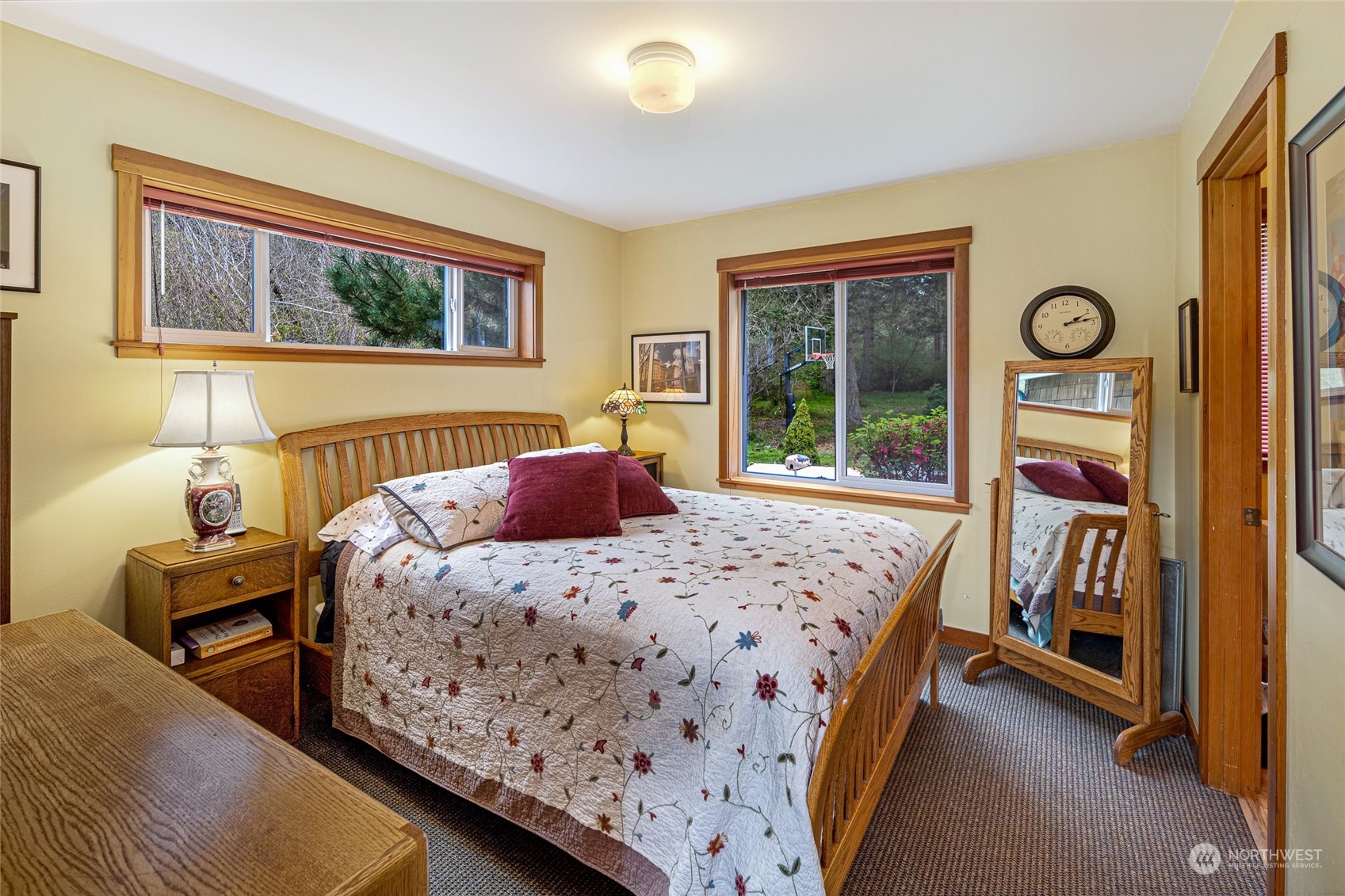 4484 Cattle Point Road Friday Harbor, WA 98250 - Photo 12 of 22 a bed sitting in a bedroom next to a window