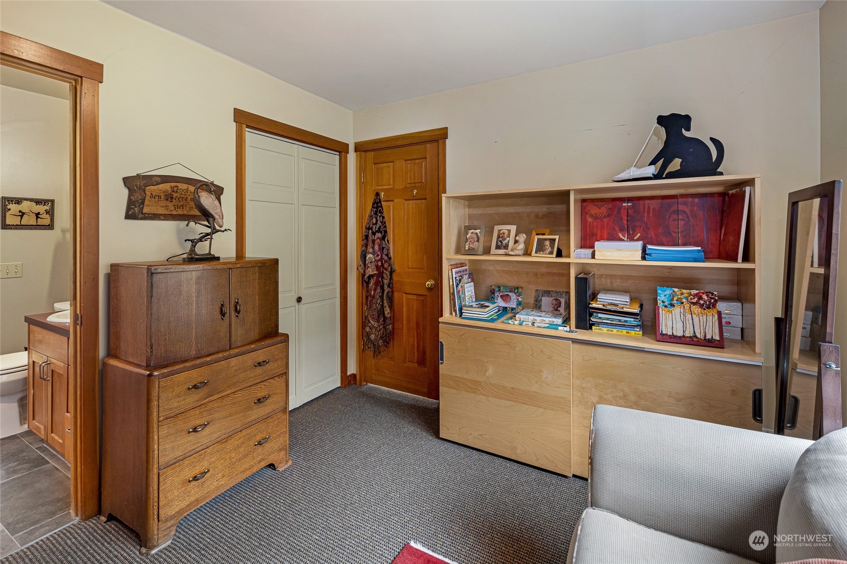 4484 Cattle Point Road Friday Harbor, WA 98250 - Photo 20 of 22 a living room with furniture and cabinets