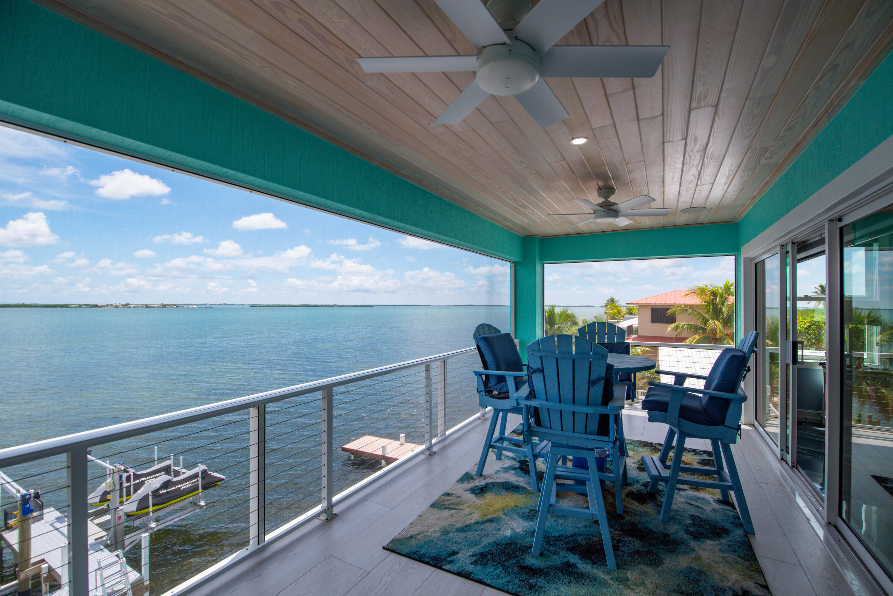 747 La Fitte Road Summerland Key, FL 33042 - Photo 32 of 103 a view of a dining room with furniture window and outside view