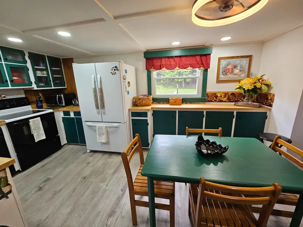 $499,999 | 856 Weeks Mills Road, New Sharon, ME 04955