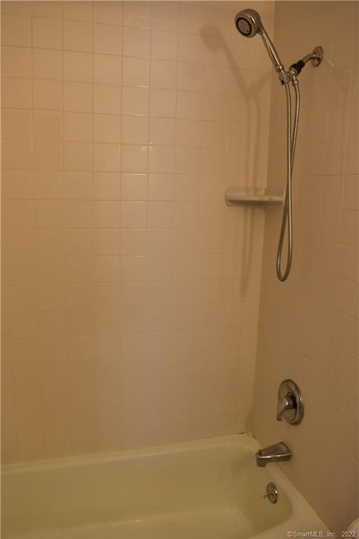 34 Bostwick Arms, Unit 34 New Milford, CT 06776 - Photo 7 of 11 a bathroom with a shower