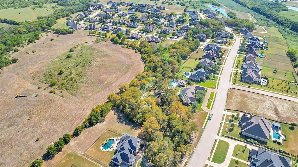 133 Falcon Point Drive Heath, TX 75032 - Photo 9 of 11 an aerial view of residential houses with outdoor space