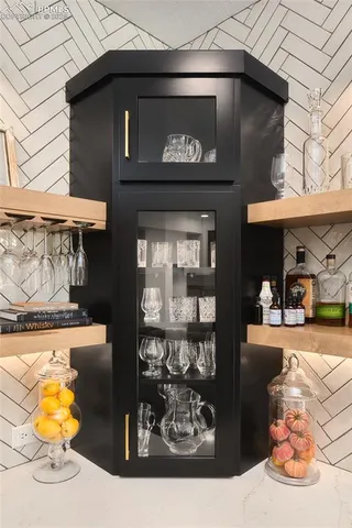 a kitchen with a stove and cabinets