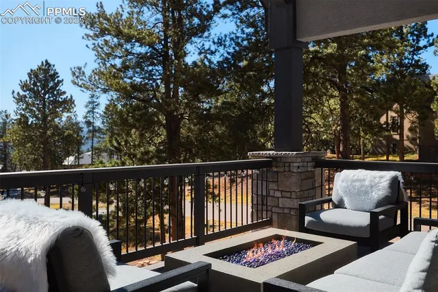 a view of balcony with furniture