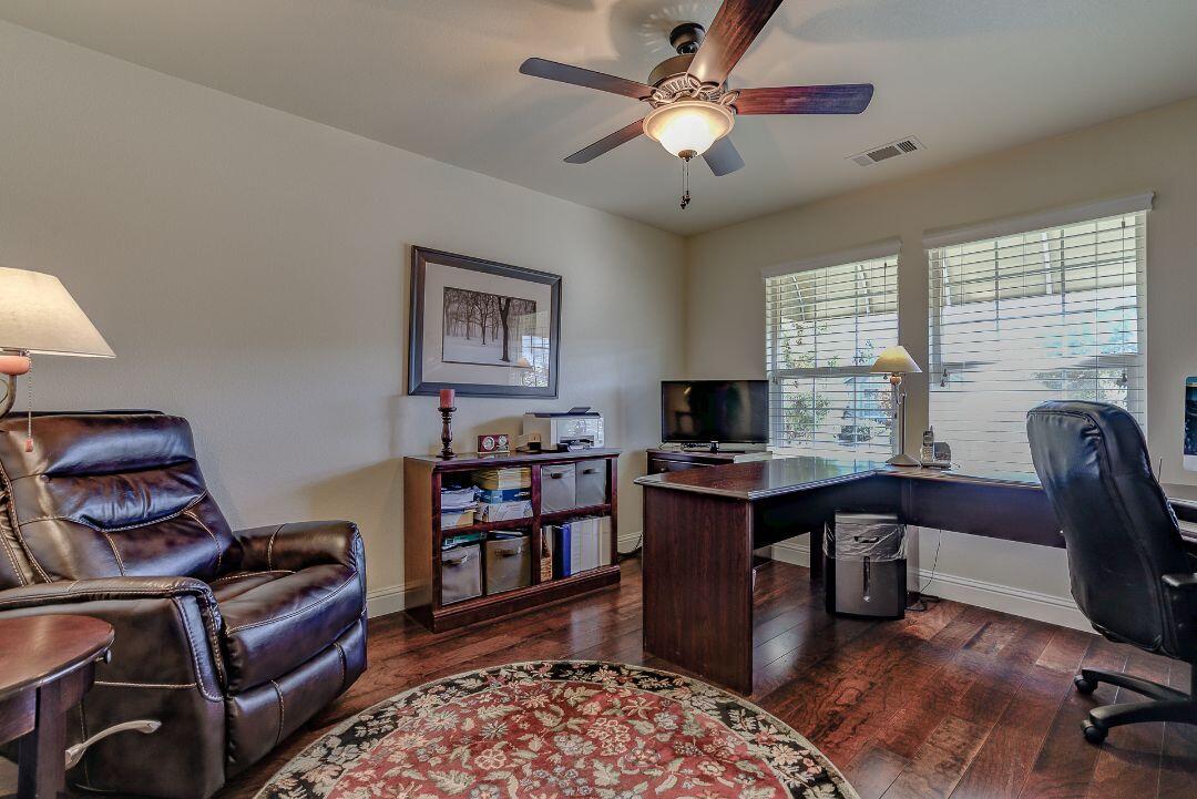 380 Franciscan Trail Redding, CA 96003 - Photo 5 of 78 a view of a workspace with furniture and a window