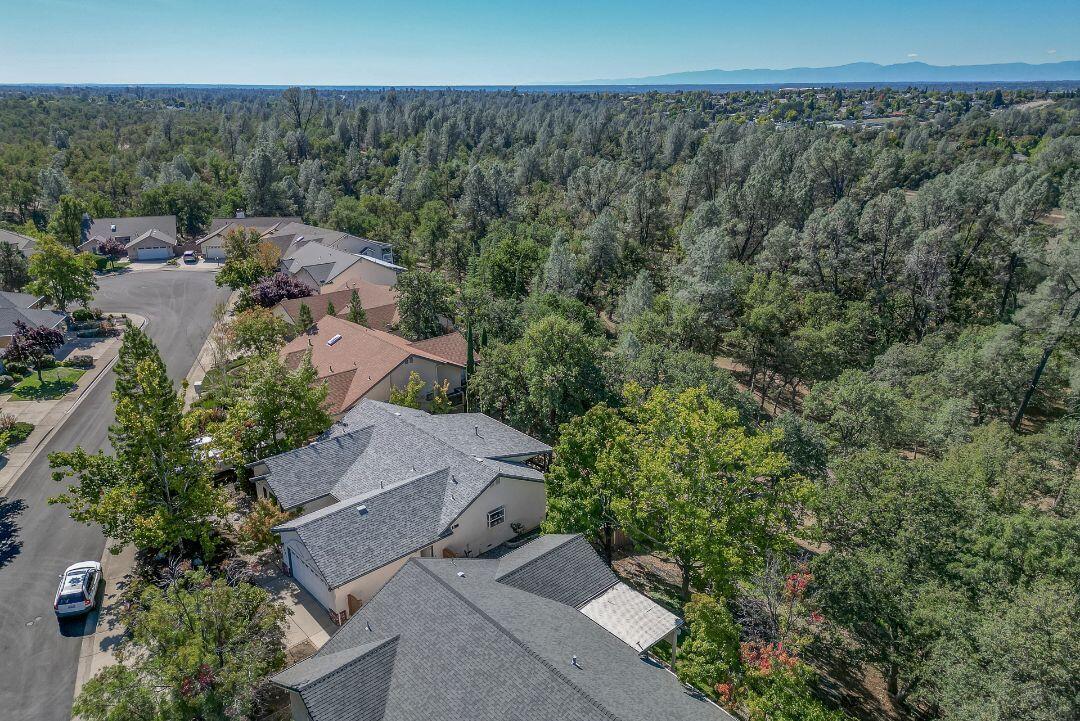 380 Franciscan Trail Redding, CA 96003 - Photo 55 of 78 an aerial view of a house with a yard