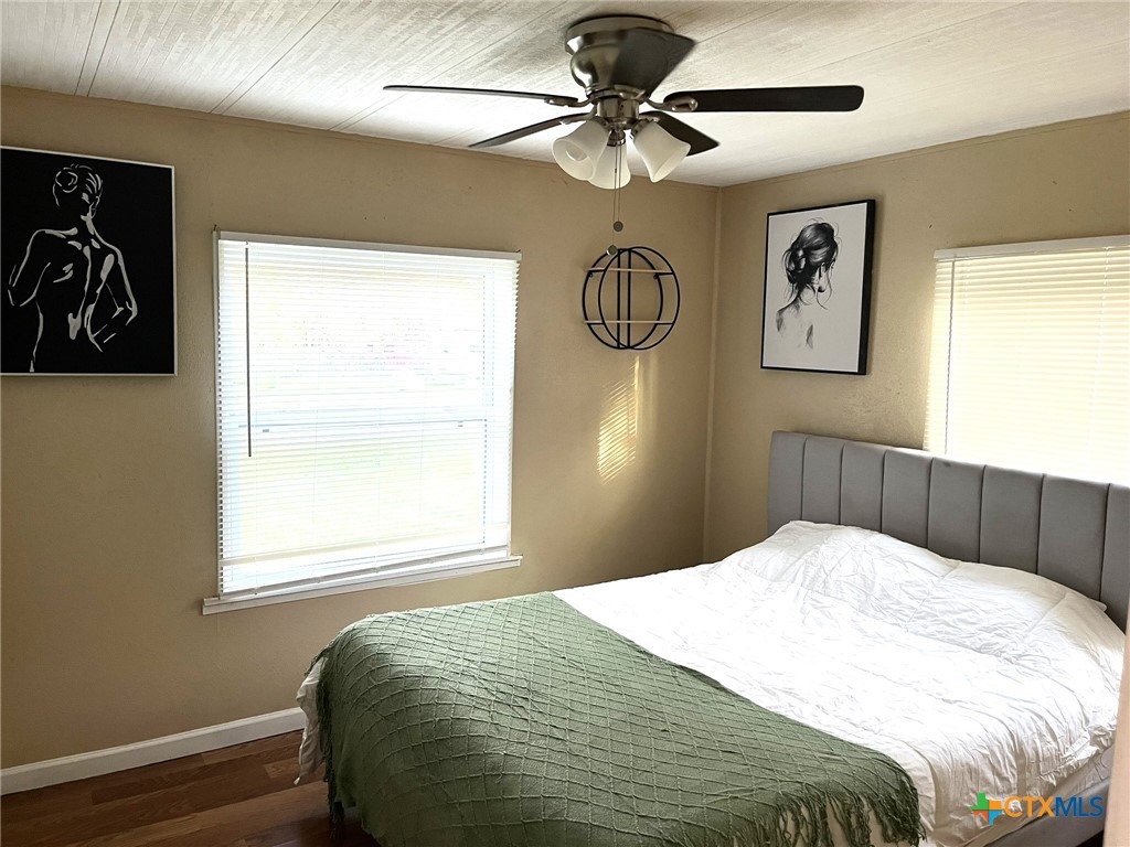 5576 Helm Lane Temple, TX 76502 - Photo 15 of 25 a bedroom with a bed and a window