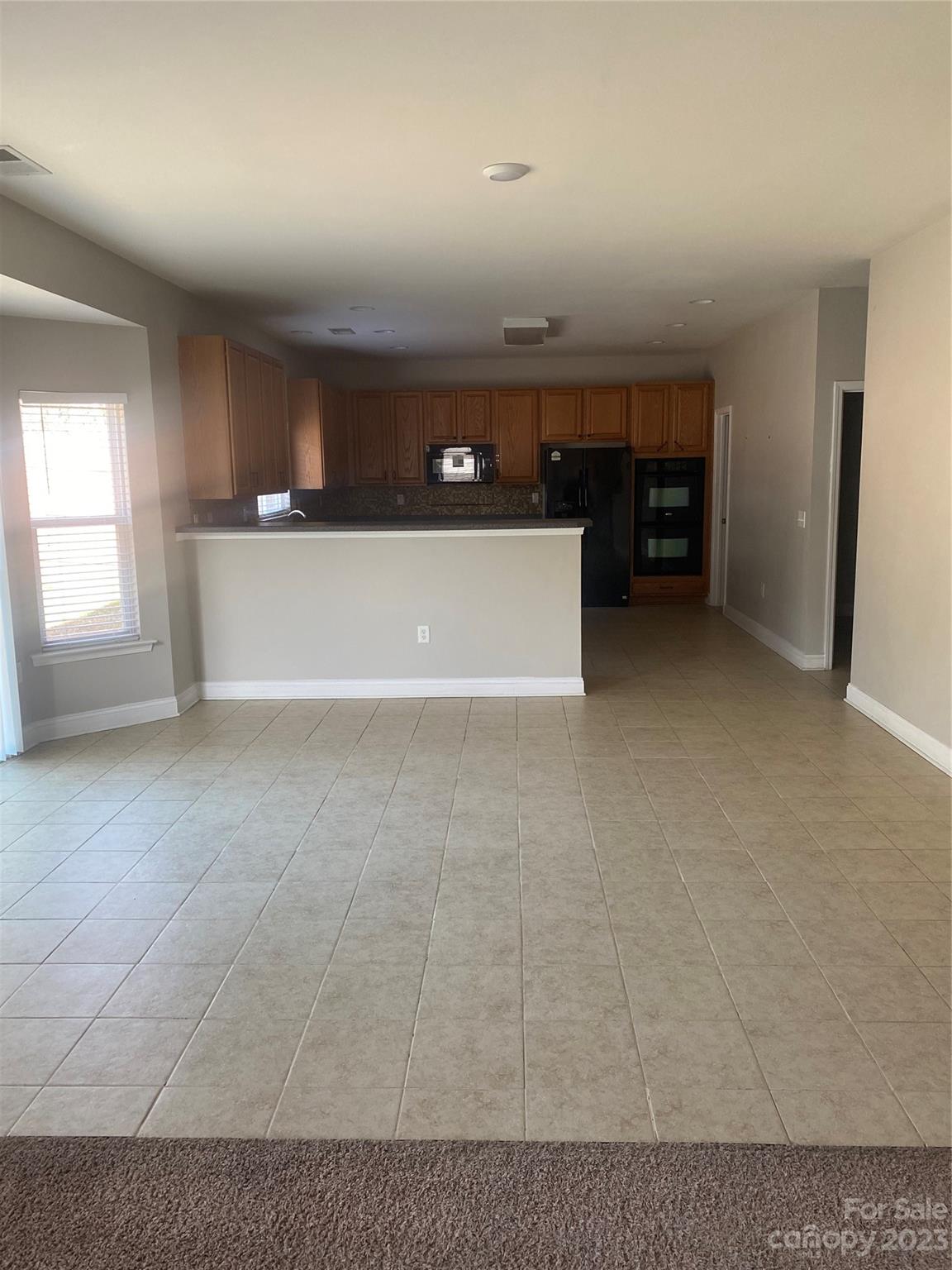 7808 Kuck Road Mint Hill, NC 28227 - Photo 11 of 34 a view of a livingroom and a kitchen
