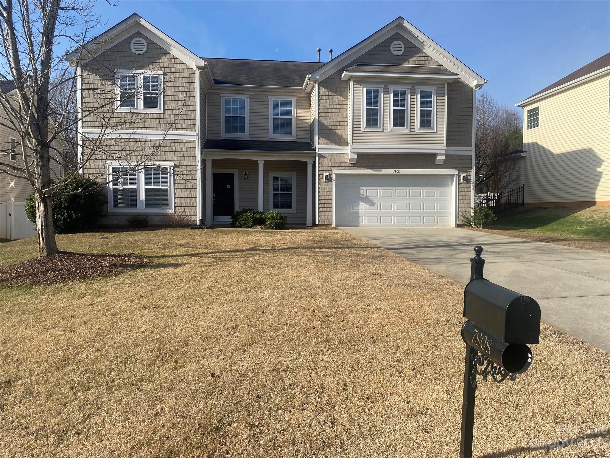 7808 Kuck Road Mint Hill, NC 28227 - Photo 2 of 34 a front view of a house with a yard