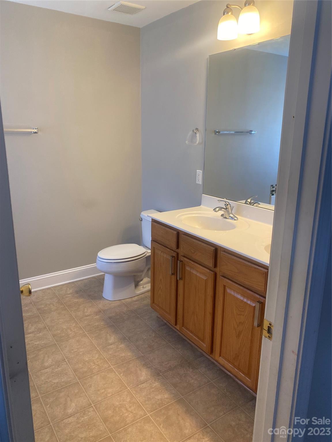 7808 Kuck Road Mint Hill, NC 28227 - Photo 30 of 34 a bathroom with a sink and a toilet