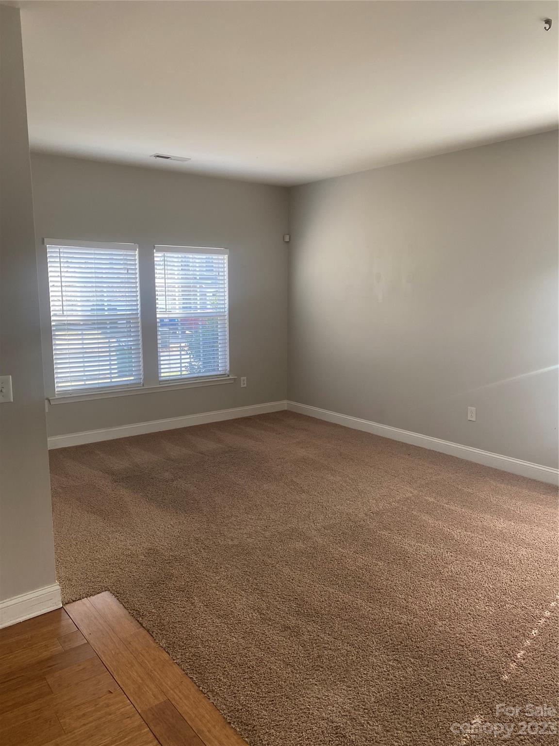 7808 Kuck Road Mint Hill, NC 28227 - Photo 6 of 34 an empty room with a windows