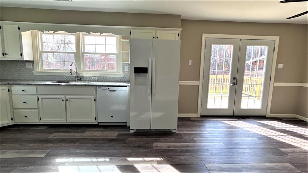 236 Smith Road Franklin, PA 16323 - Photo 8 of 22 a view of a kitchen with wooden floor and a window