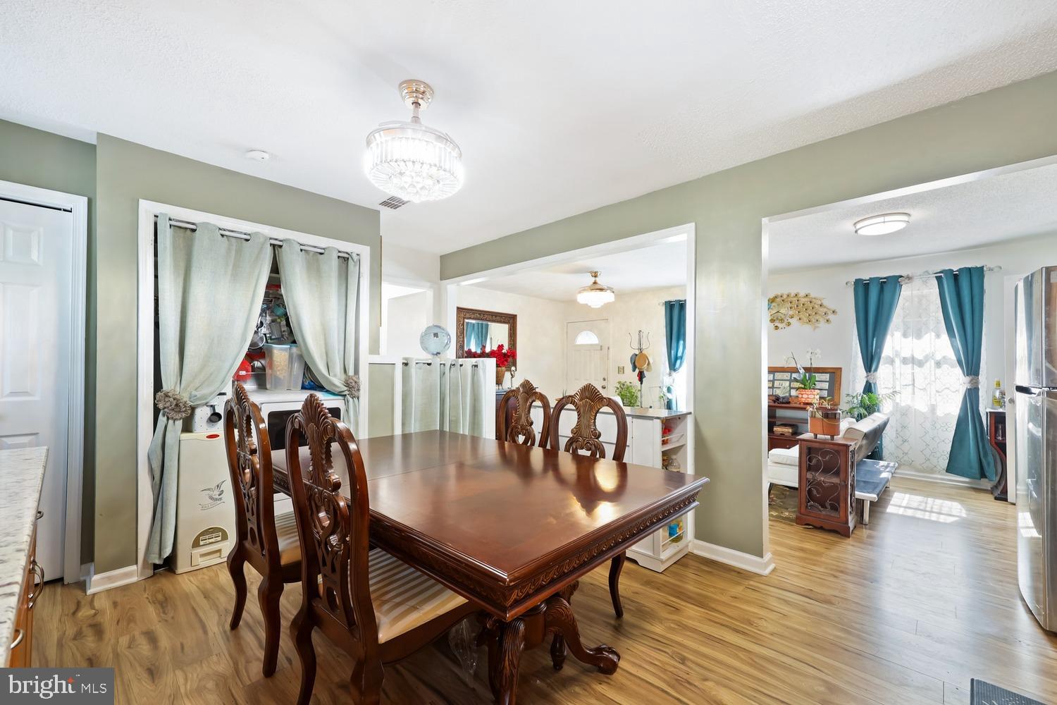 9463 Rogues Road Midland, VA 22728 - Photo 14 of 35 a view of a dining room with furniture and wooden floor