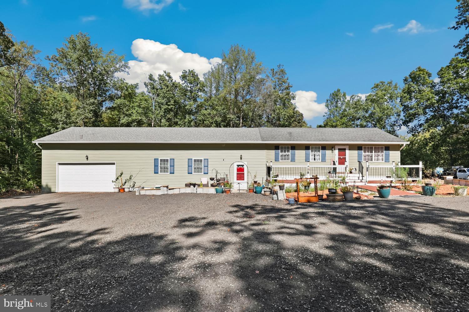 9463 Rogues Road Midland, VA 22728 - Photo 9 of 35 a view of a house with a patio