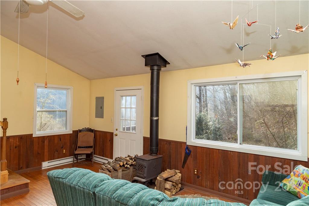 7442 Little Pine Road Marshall, NC 28753 - Photo 10 of 35 a living room with furniture and a window