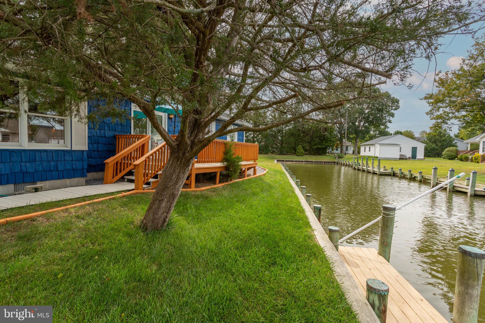 32396 Holly Ter Road Ocean View, DE 19970 - Photo 31 of 42 a view of a house with a yard