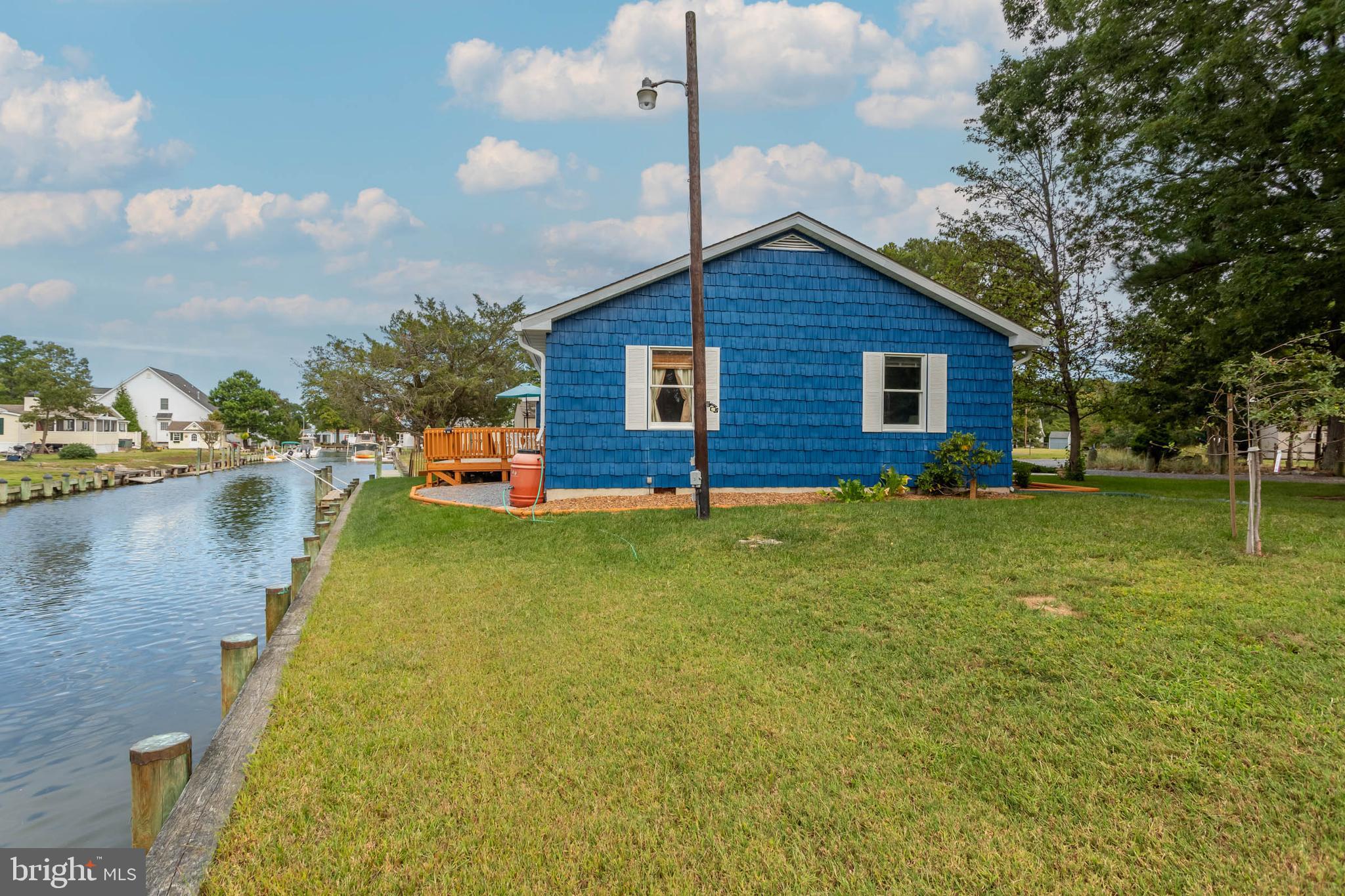 32396 Holly Ter Road Ocean View, DE 19970 - Photo 32 of 42 a view of a house with pool