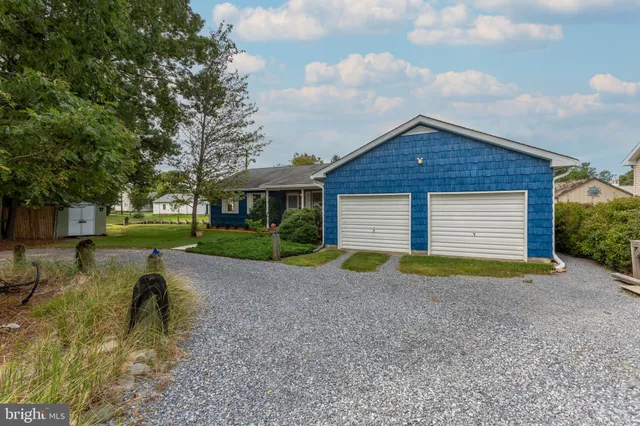 a view of outdoor space yard and garage