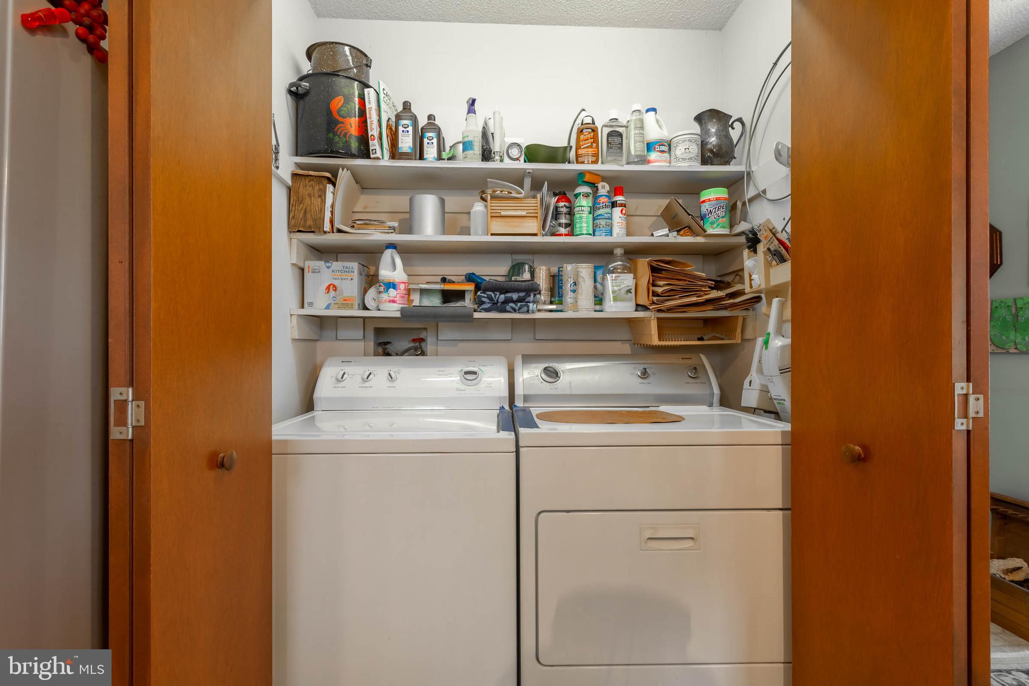 32396 Holly Ter Road Ocean View, DE 19970 - Photo 10 of 42 a room with storage and utility