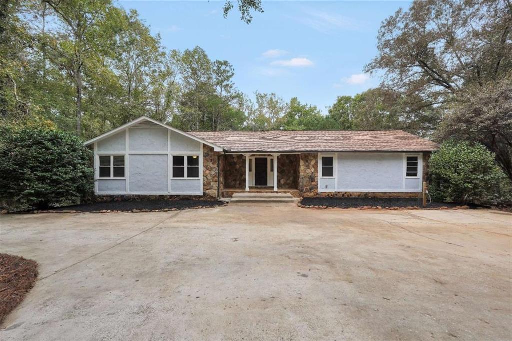 front view of a house with a yard