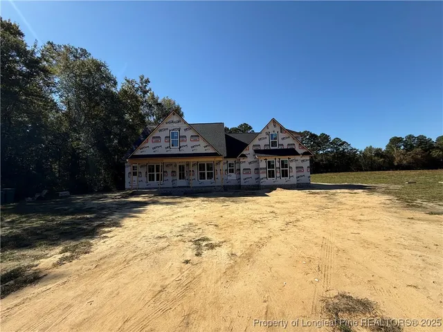 a view of a house with snow on the ground