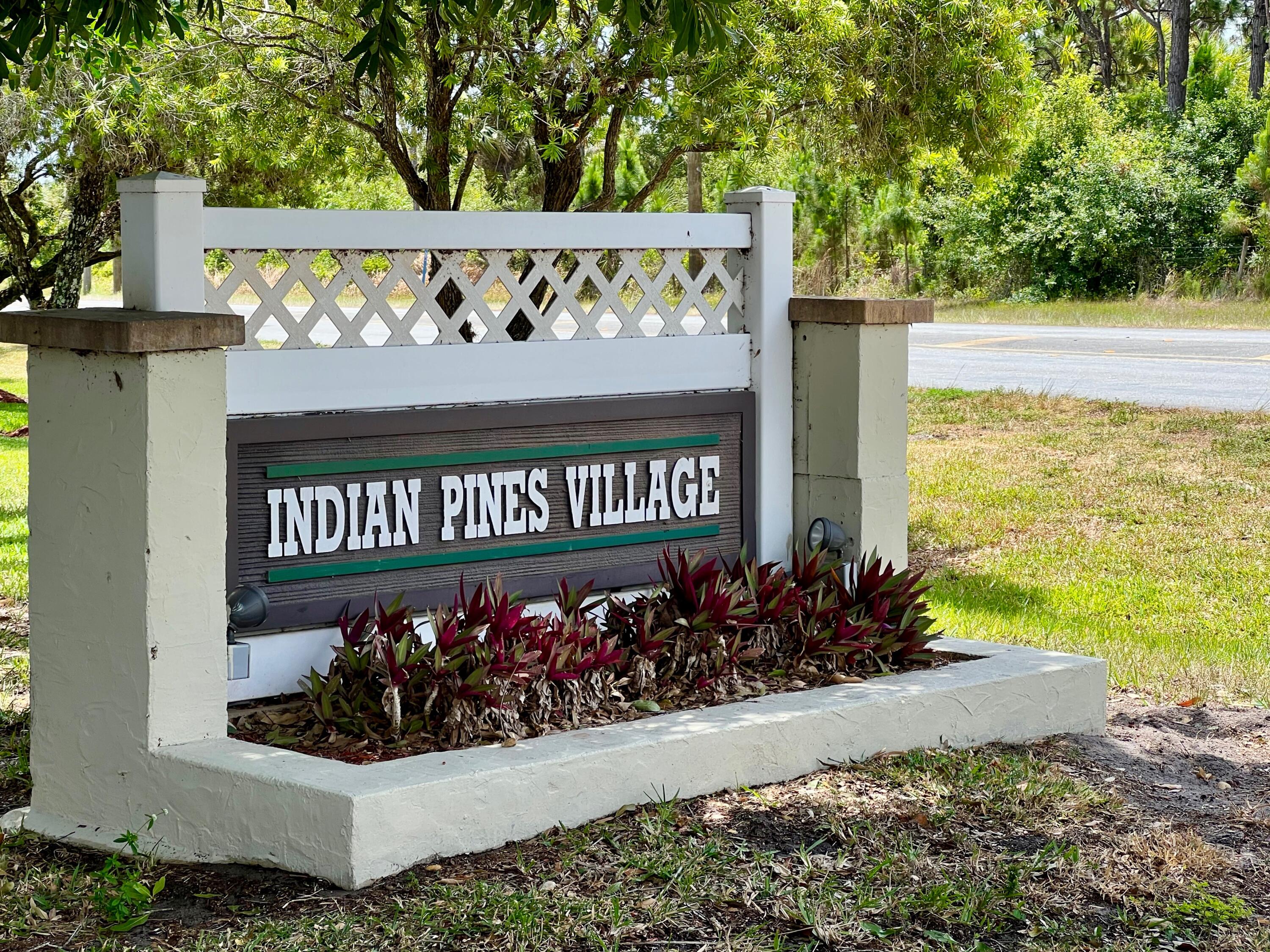 6024 Indrio Road, Unit L6 Fort Pierce, FL 34951 - Photo 1 of 17 a view of a sign board