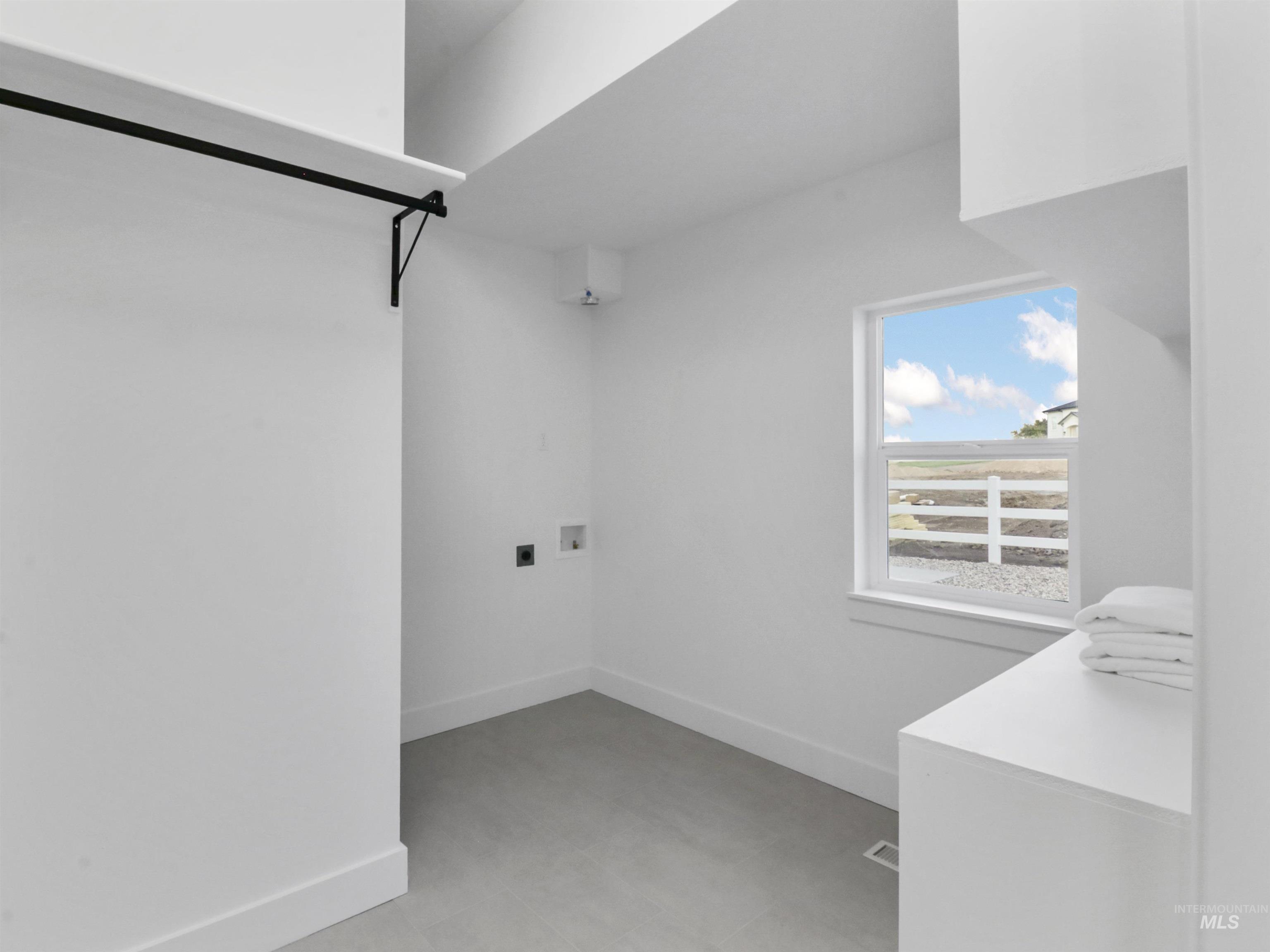 8991 Edna Lane Middleton, ID 83644 - Photo 21 of 50 Washroom with baseboards and washer hookup