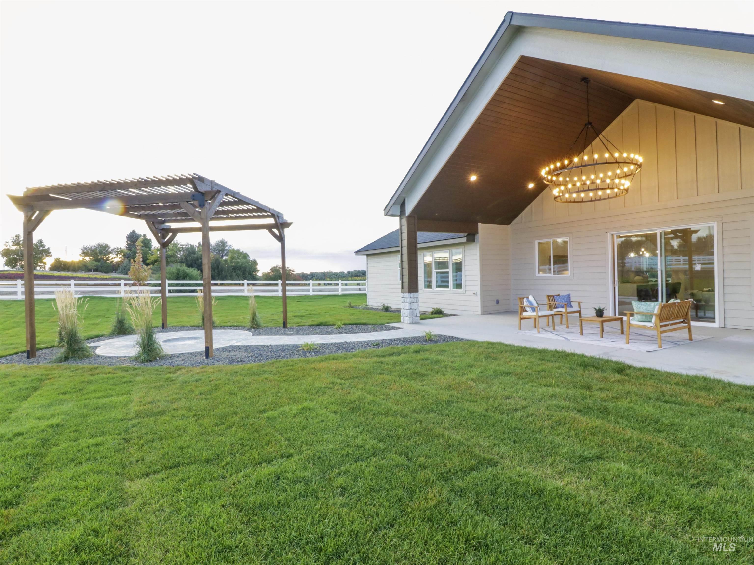 8991 Edna Lane Middleton, ID 83644 - Photo 40 of 50 View of yard featuring a patio area and a pergola