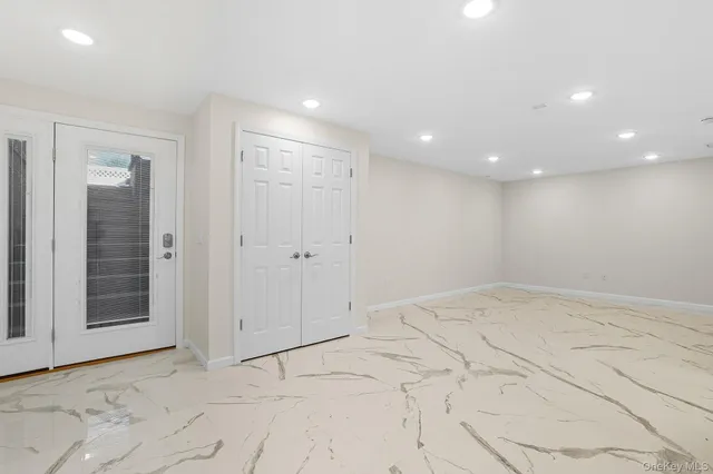a kitchen with stainless steel appliances granite countertop a stove and a microwave