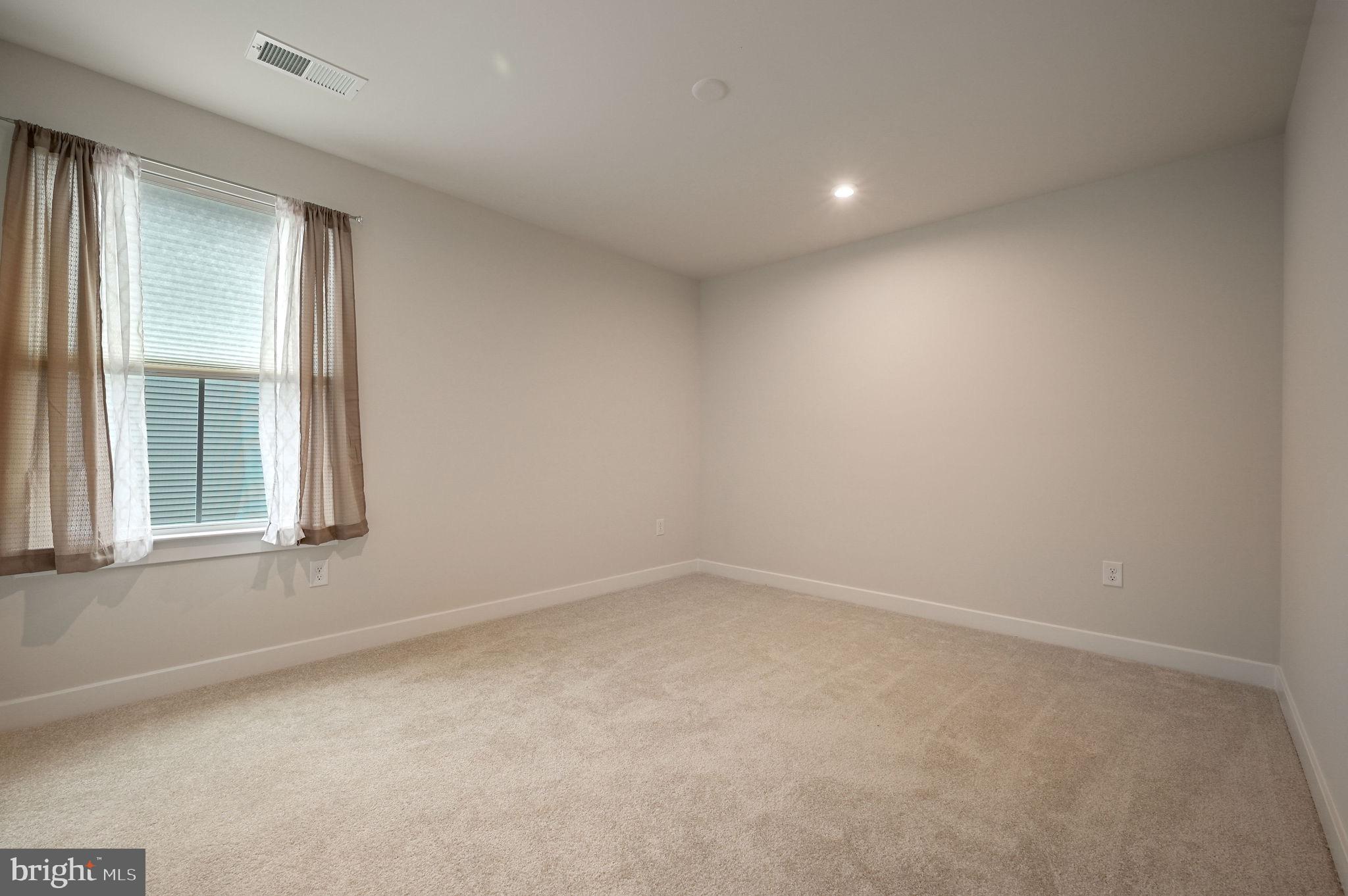 30366 Indigo Way Georgetown, DE 19947 - Photo 29 of 37 an empty room with a window