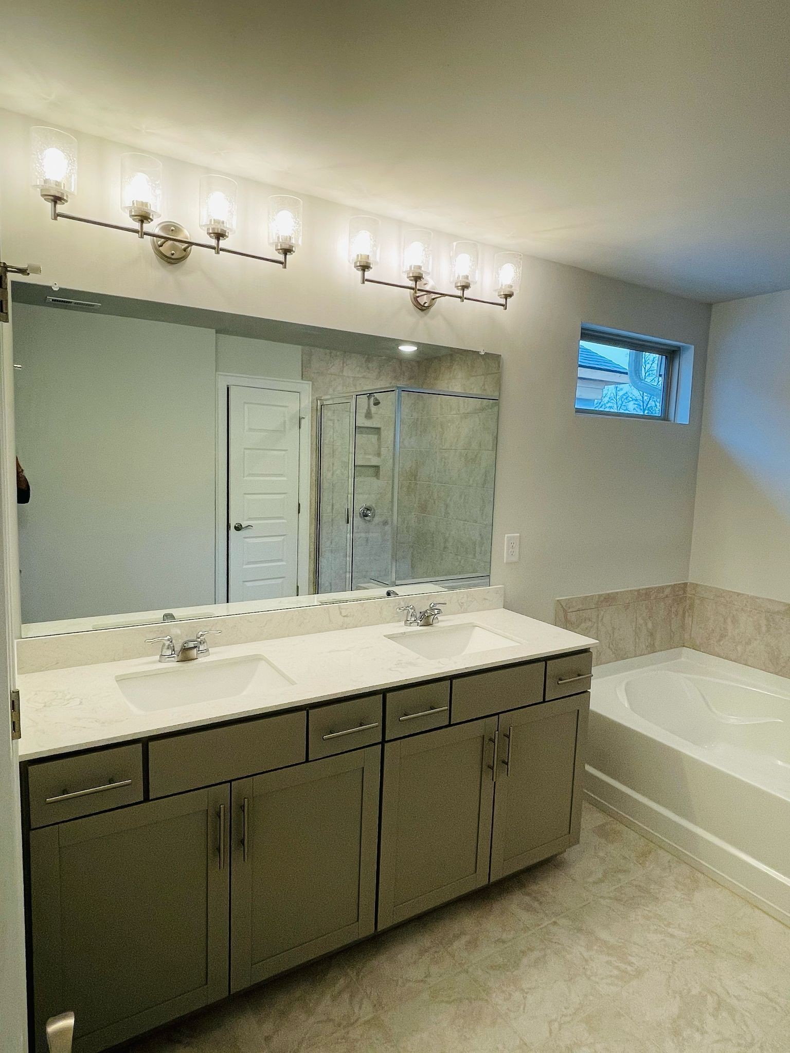 1108 Carlisle Place Mount Juliet, TN 37122 - Photo 9 of 20 a bathroom with a tub sink and mirror