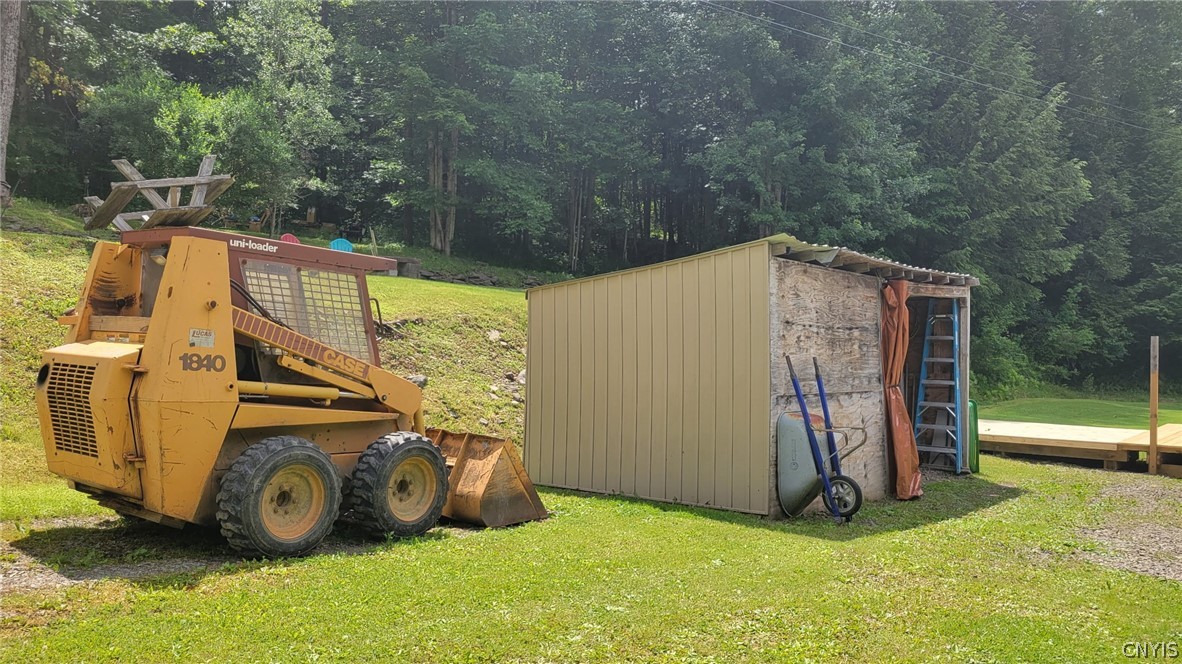 4524 Maybury Road Solon, NY 13101 - Photo 24 of 42 Skid Steer/Storage shed