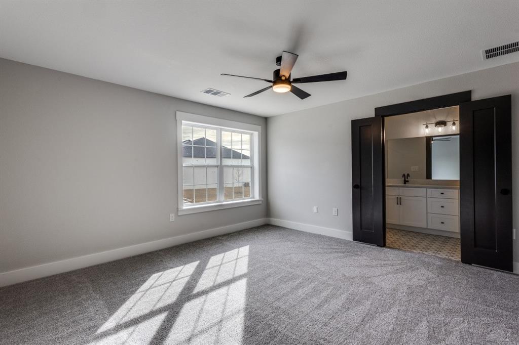 1610 Palladio Loop Princeton, TX 75407 - Photo 11 of 20 a view of a livingroom with a ceiling fan and window